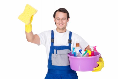 Professional carpet cleaner working on a residential carpet in W9