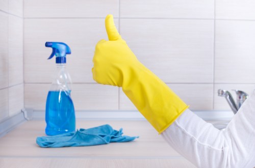 Local cleaner in W9 vacuuming a stylish apartment
