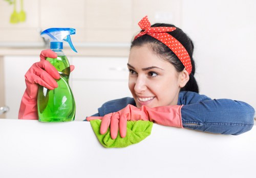 Local cleaning company in W9 performing deep cleaning in a kitchen